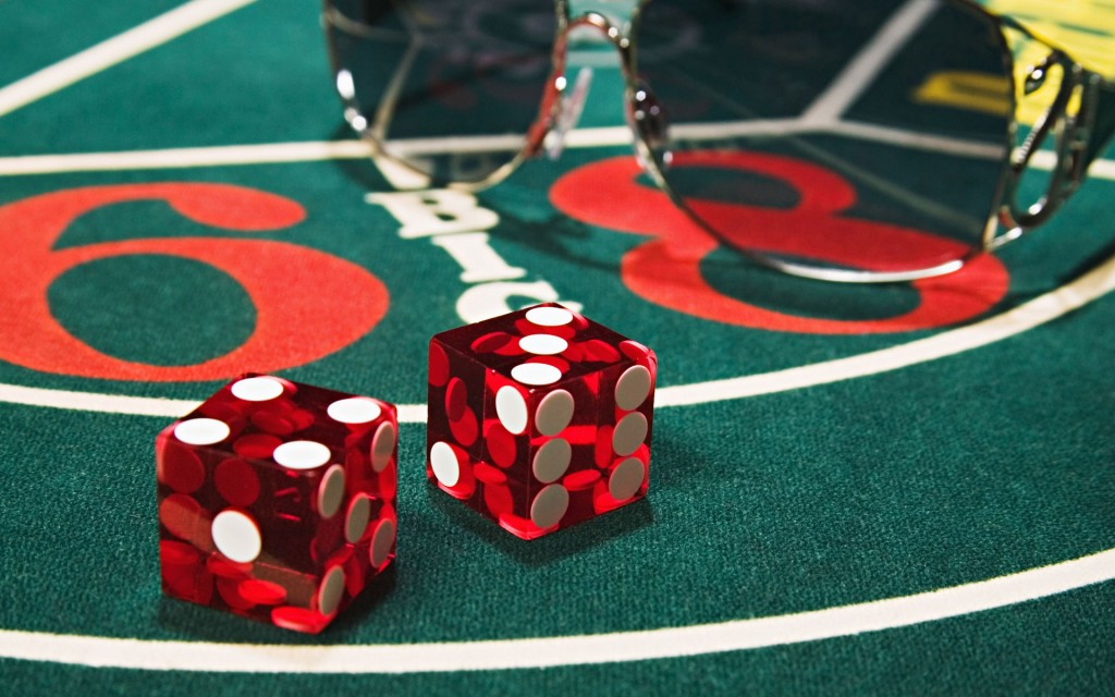 Sunglasses on a craps table